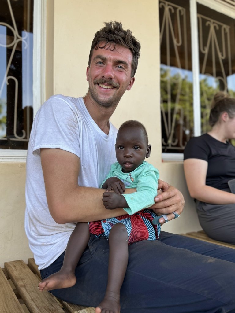 A Generous Hearts participant serving during a Uganda mission trip.